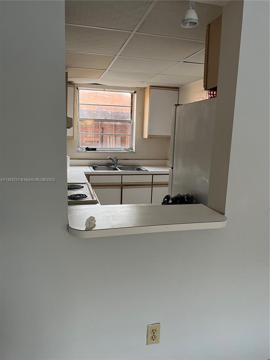 15103 Southwest 81st Street, Unit 213 Miami, FL 33193 - Photo 10 of 22 a view of counter top