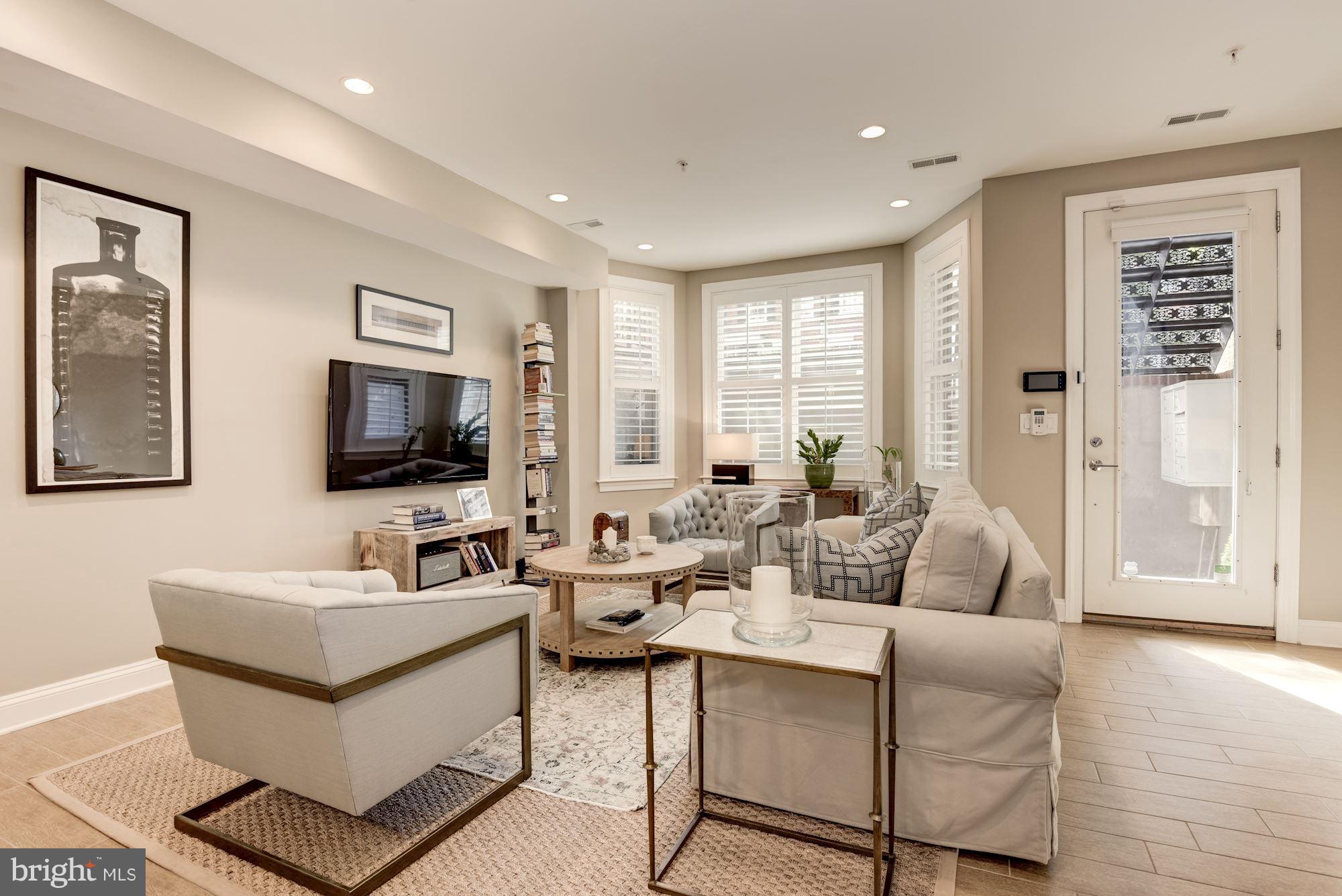 1431 Corcoran Street Northwest, Unit 1 Washington, DC 20009 - Photo 2 of 22 Living Room w/ Bay Window
