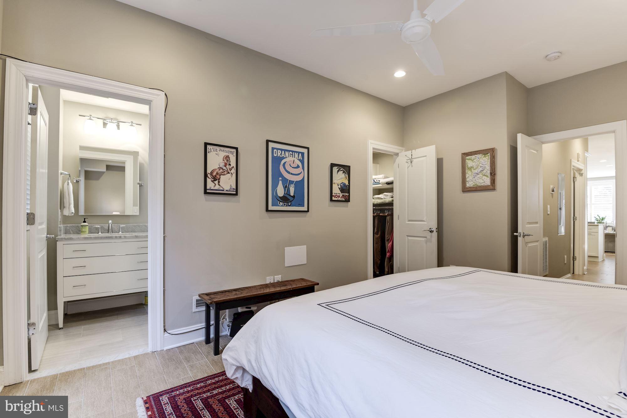 1431 Corcoran Street Northwest, Unit 1 Washington, DC 20009 - Photo 10 of 22 Master Bedroom w/ Walk-in Closet + En-Suite Bath