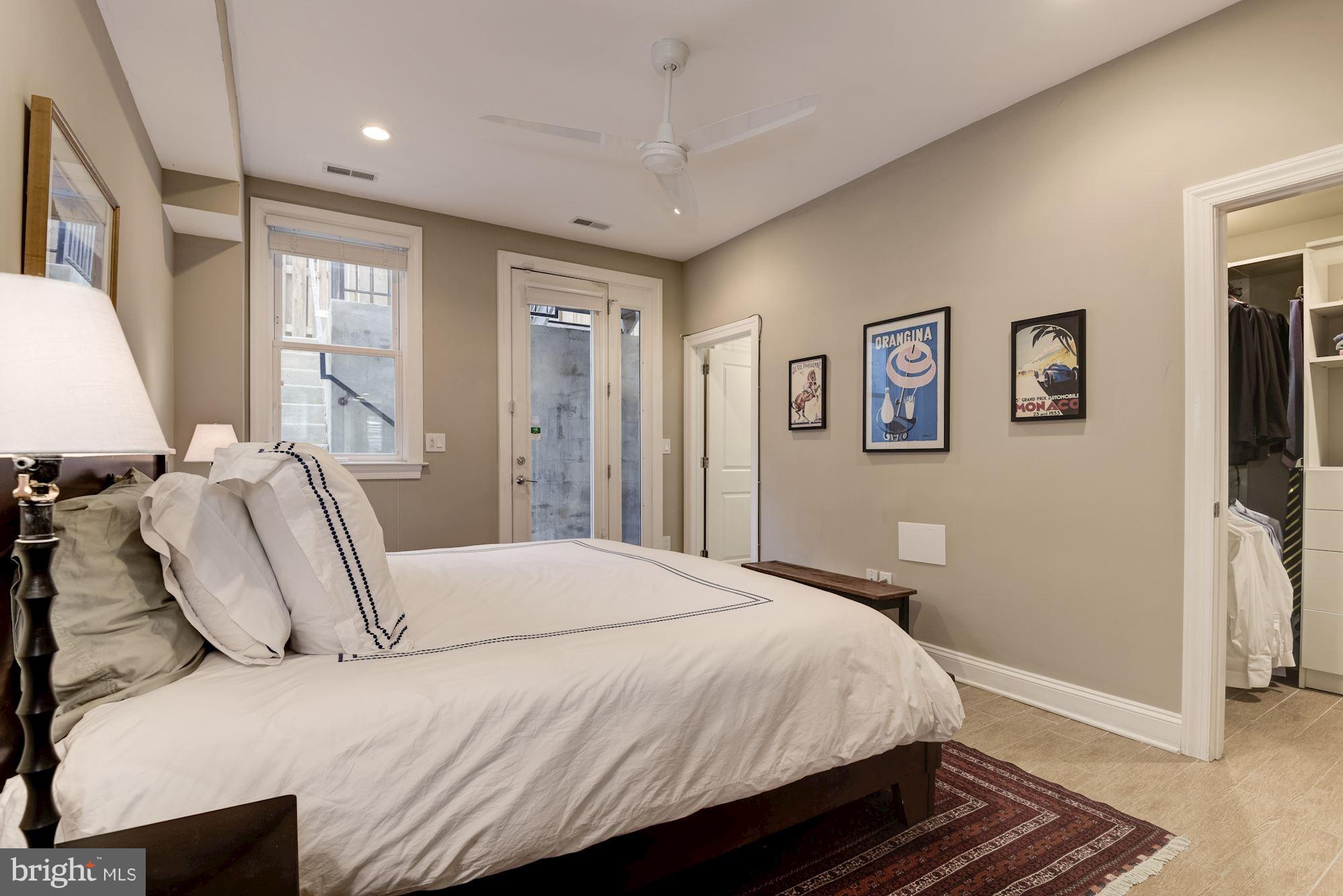 1431 Corcoran Street Northwest, Unit 1 Washington, DC 20009 - Photo 9 of 22 Master Bedroom w/ Walk-in Closet + En-Suite Bath