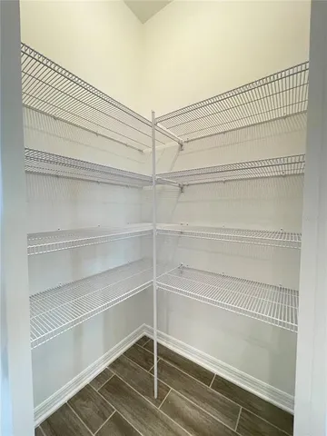 a view of a room with shelves