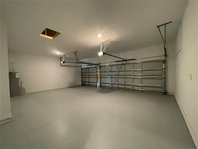 a view of a room with furniture and stairs