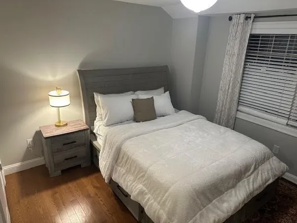 a kitchen with stainless steel appliances granite countertop a sink refrigerator and microwave