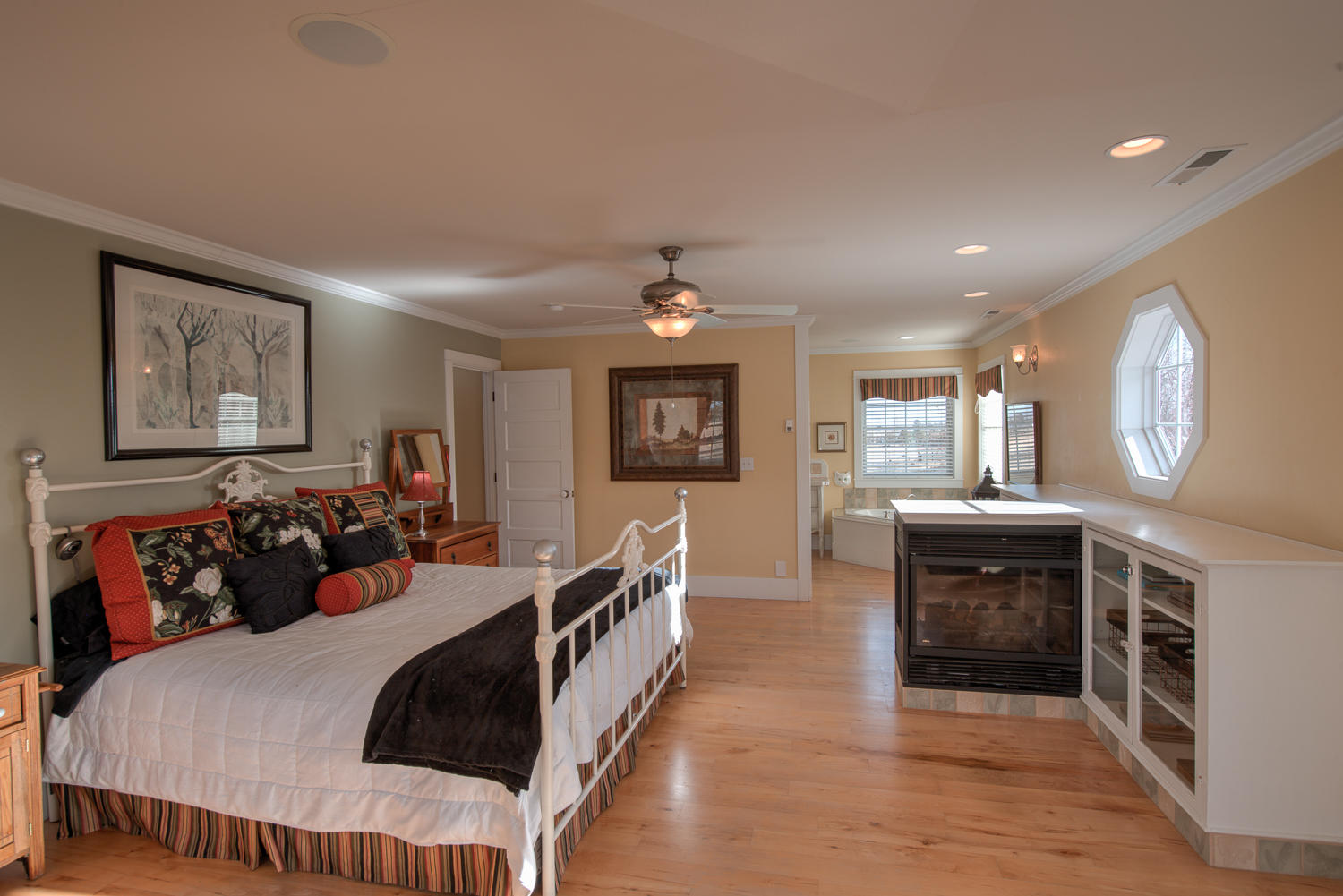 22222 Erickson Road Bend, OR 97701 - Photo 36 of 100 a bed room with furniture and a fireplace