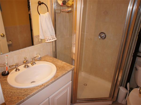 202 K Street, Unit 7 Boston, MA 02127 - Photo 6 of 10 a bathroom with a sink and a mirror