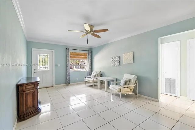 a living room with furniture and window