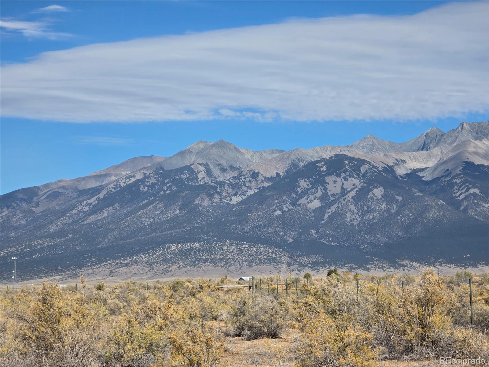 7881 Foothill Boulevard Alamosa, CO 81101 - Photo 18 of 25 a view of a mountain from a yard