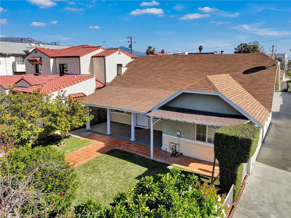 102 South Curtis Avenue Alhambra, CA 91801 - Photo 1 of 1 an aerial view of a house with yard porch and furniture