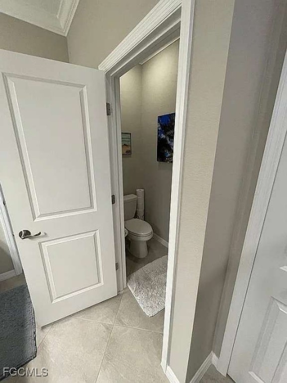 2190 Clementine Street Naples, FL 34120 - Photo 12 of 16 a view of bathroom with a toilet and a sink