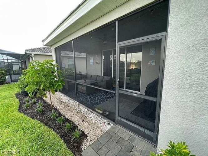 2190 Clementine Street Naples, FL 34120 - Photo 3 of 16 a view of backyard with potted plants