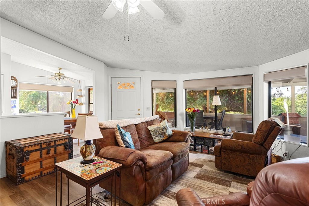 1477 Flag Creek Road Oroville, CA 95965 - Photo 23 of 75 a living room with furniture and a large window