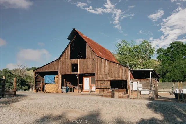 a view of a field with an trees