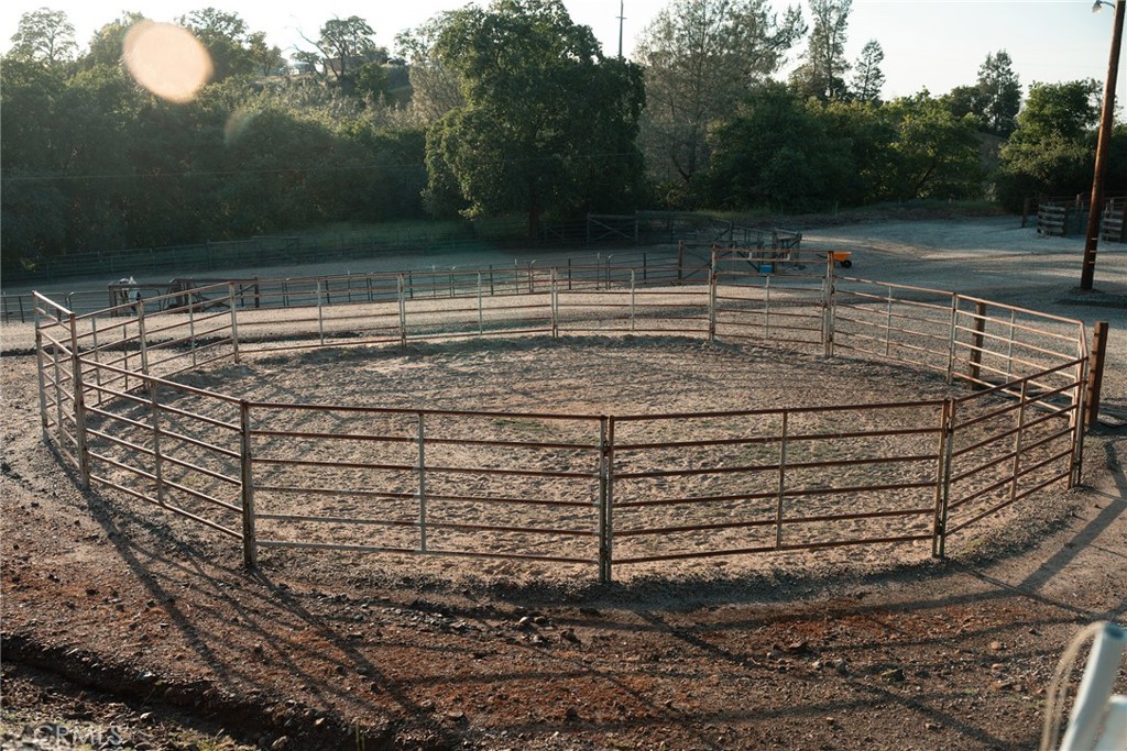 1477 Flag Creek Road Oroville, CA 95965 - Photo 53 of 75 a view of a swimming pool with a yard