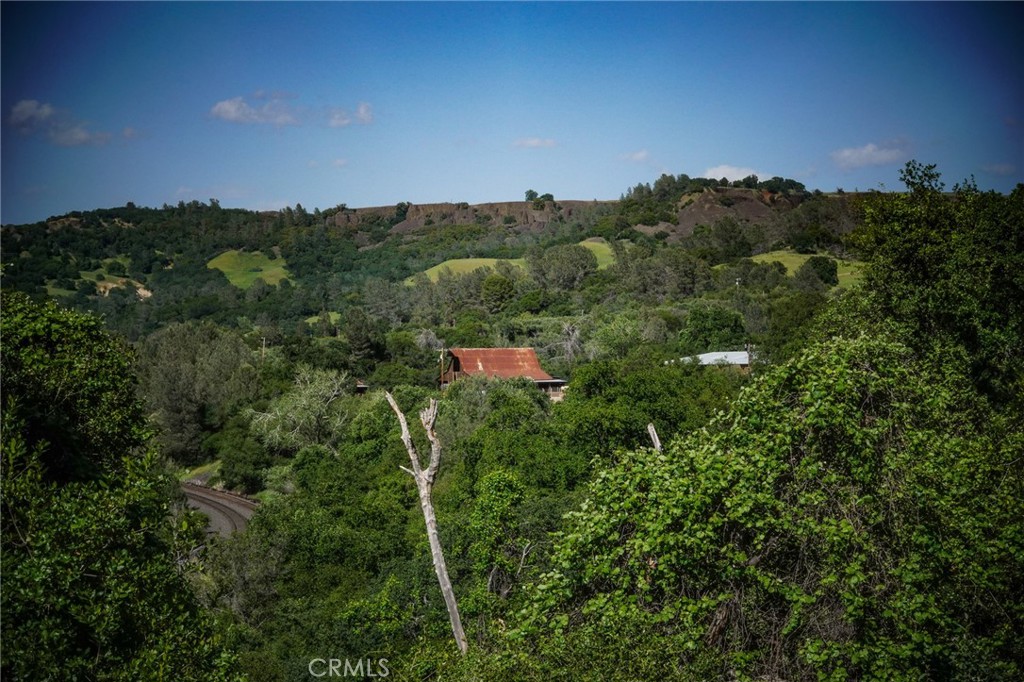 1477 Flag Creek Road Oroville, CA 95965 - Photo 63 of 75 an aerial view of a house with a yard