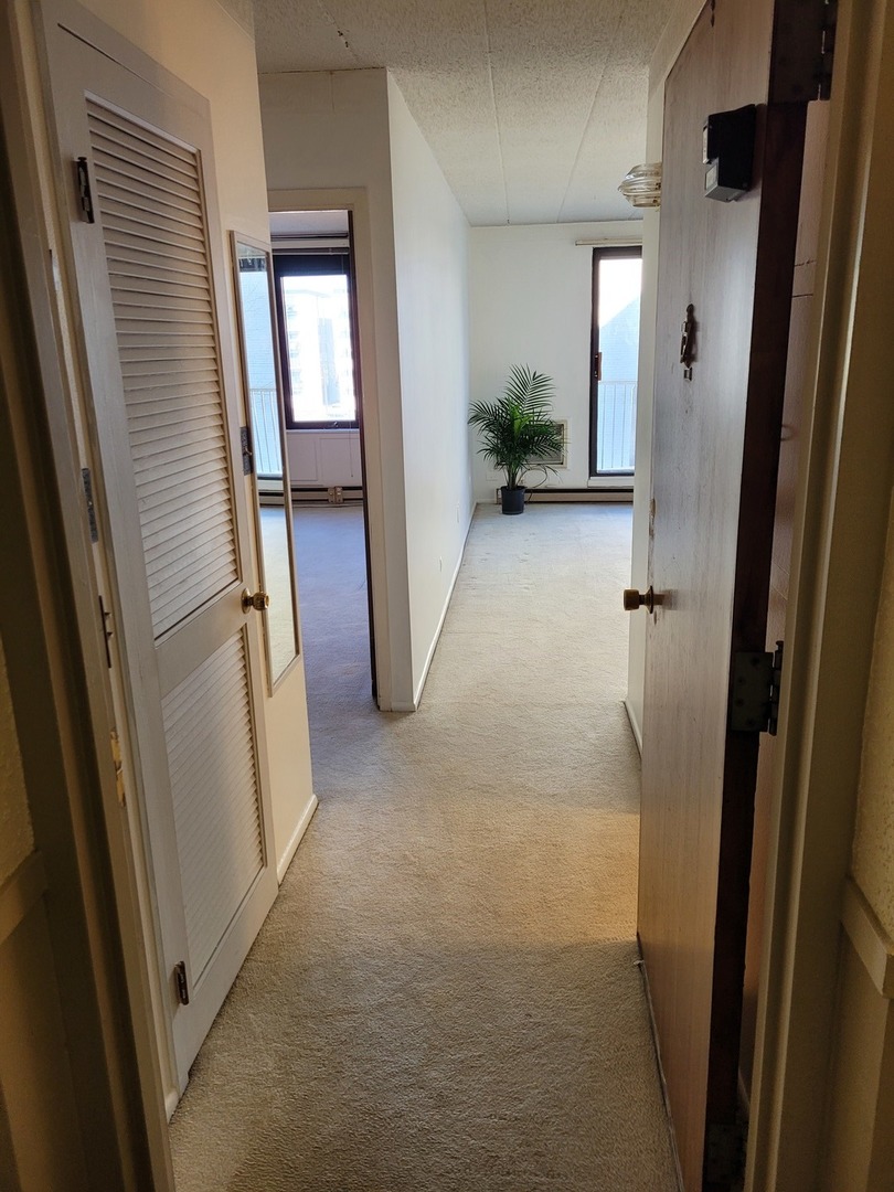 9701 Dee Road, Unit 4F Niles, IL 60714 - Photo 16 of 20 wooden floor in a gallery