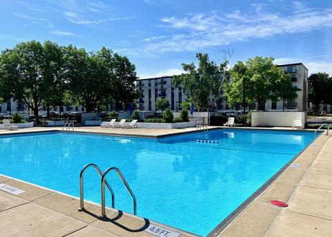 9701 Dee Road, Unit 4F Niles, IL 60714 - Photo 20 of 20 a view of a swimming pool with a patio