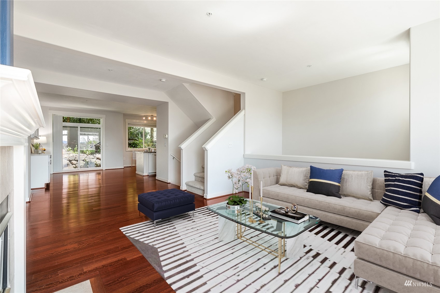 23300 Southeast Black Nugget Road, Unit D3 Issaquah, WA 98029 - Photo 14 of 27 a living room with furniture and a wooden floor
