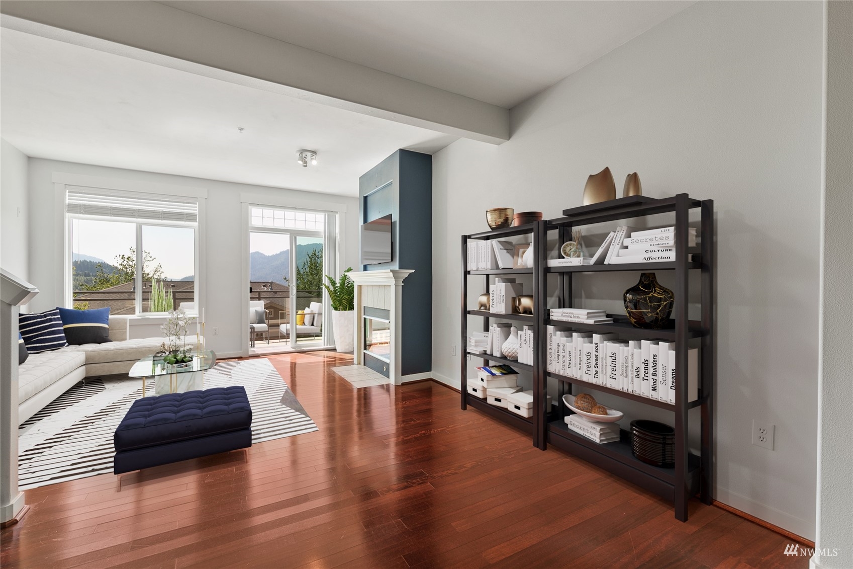 23300 Southeast Black Nugget Road, Unit D3 Issaquah, WA 98029 - Photo 15 of 27 a living room with furniture and a wooden floor
