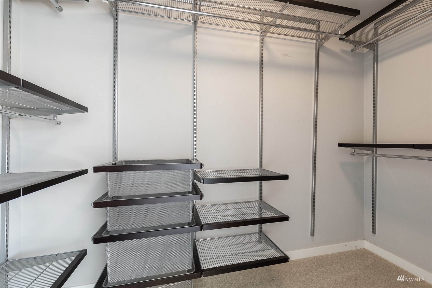 23300 Southeast Black Nugget Road, Unit D3 Issaquah, WA 98029 - Photo 18 of 27 a bathroom with a shower and a glass door