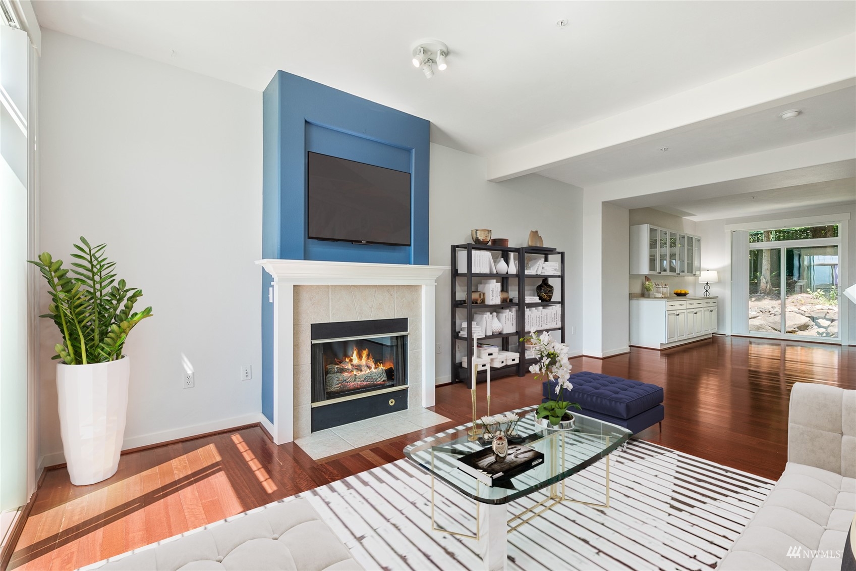 23300 Southeast Black Nugget Road, Unit D3 Issaquah, WA 98029 - Photo 4 of 27 a living room with furniture and a fireplace