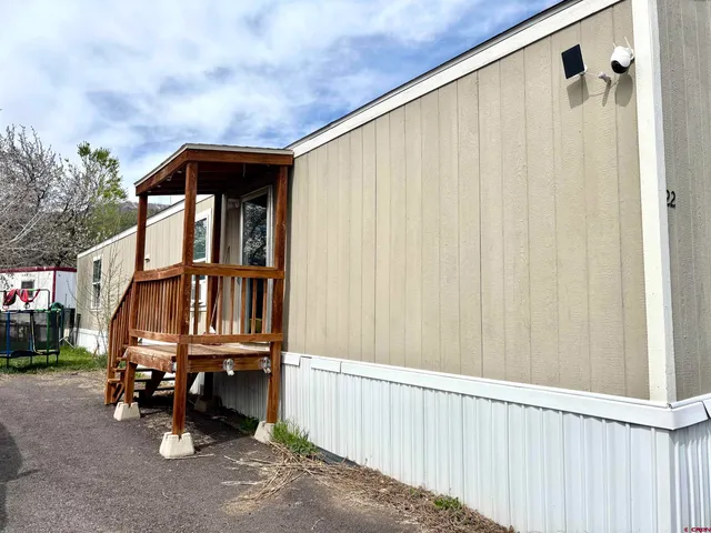 a house view with a backyard space