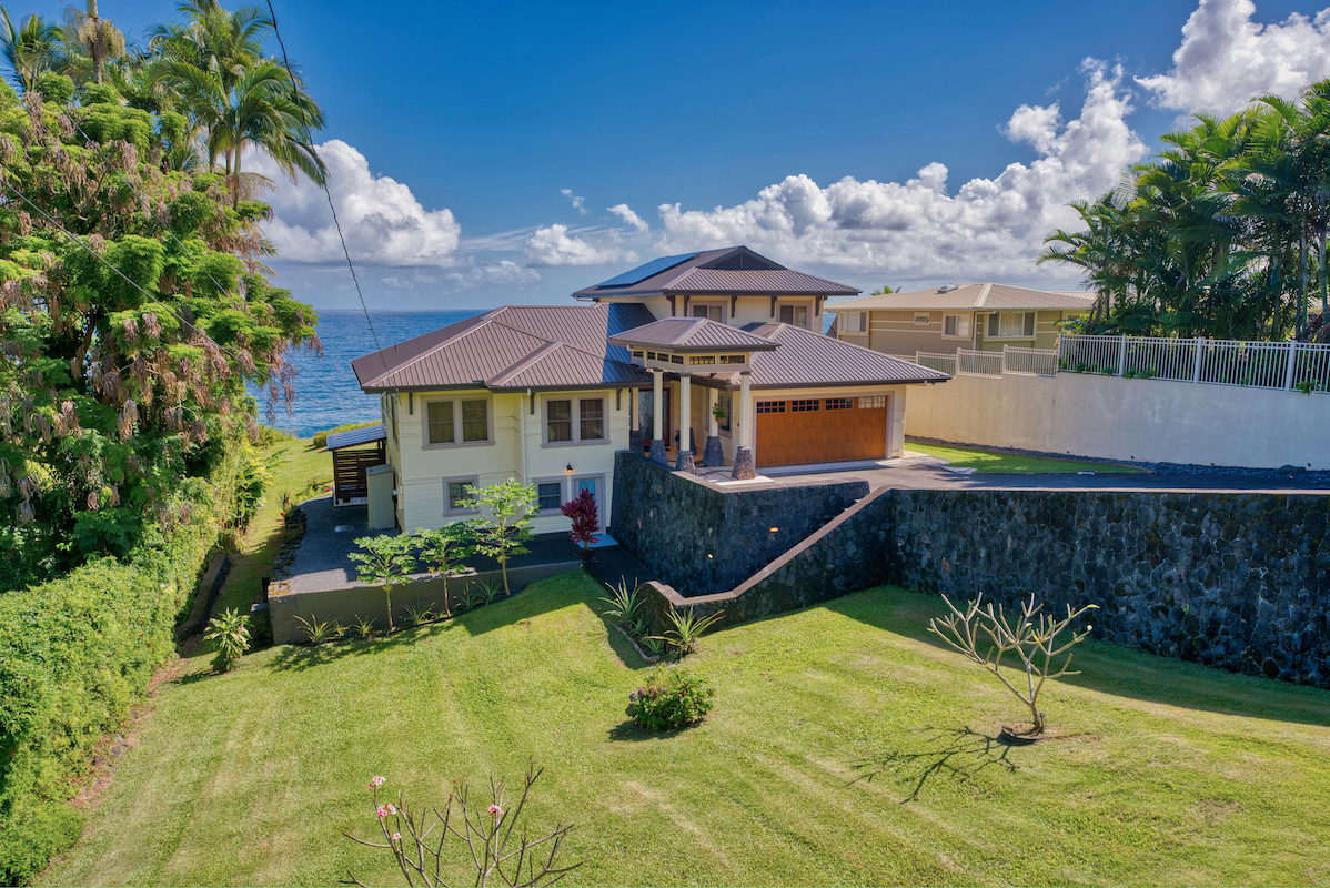 33 Honolii Place Hilo, HI 96720 - Photo 1 of 30 a view of a house with swimming pool and sitting area