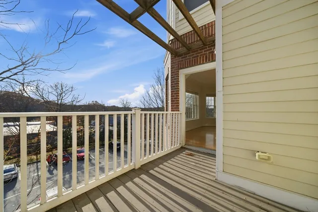 a view of a brick house with wooden floor