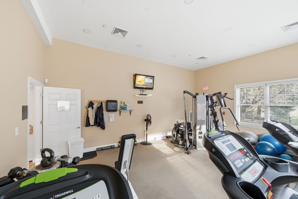 295 Salem Street, Unit 82 Woburn, MA 01801 - Photo 31 of 36 a view of a room with gym equipment