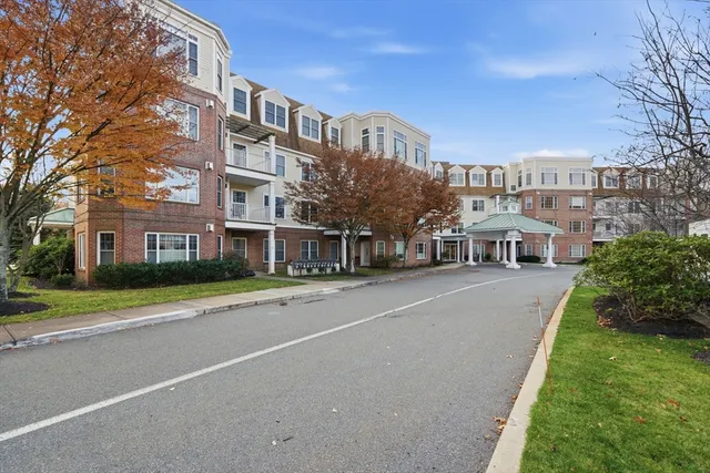 a view of a cars parked in front of a house