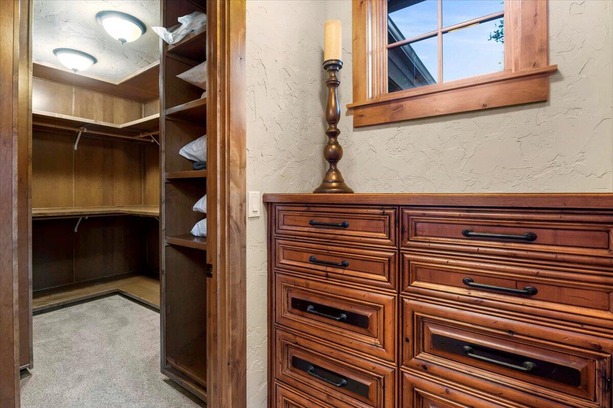 56184 Sable Rock Loop Bend, OR 97707 - Photo 36 of 72 Custom built in dresser and spacious walk in closet