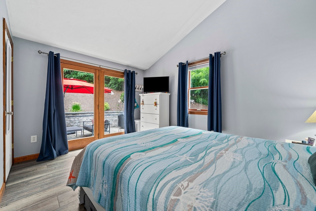 7 Signal Hill Road Marshfield, MA 02050 - Photo 12 of 42 a bedroom with a bed and a large window
