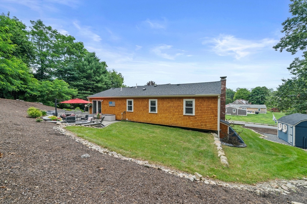 7 Signal Hill Road Marshfield, MA 02050 - Photo 26 of 42 a view of a house with a back yard