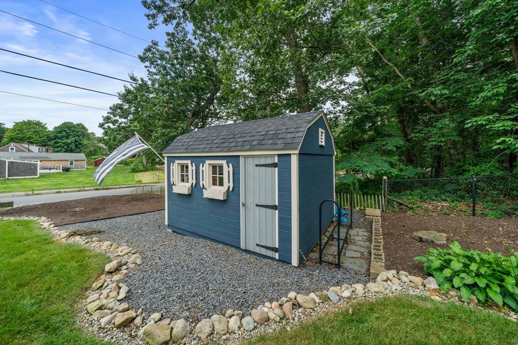 7 Signal Hill Road Marshfield, MA 02050 - Photo 28 of 42 a view of backyard with green space