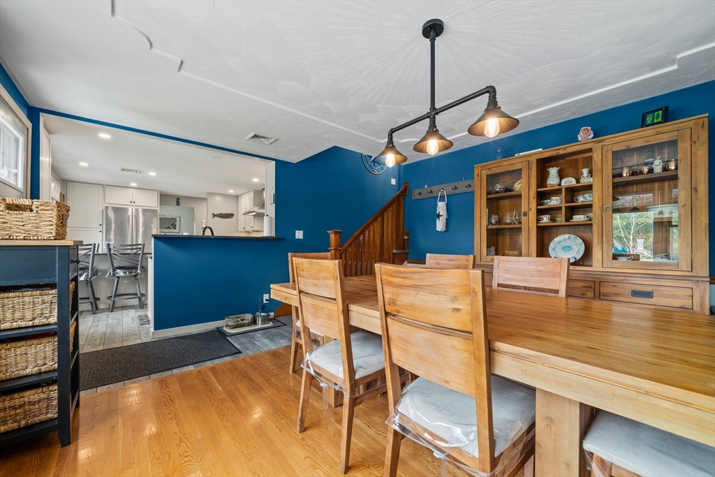 7 Signal Hill Road Marshfield, MA 02050 - Photo 8 of 42 a view of a dining room with furniture and wooden floor