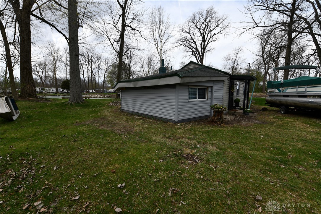 5445 Behm Road, Unit 15 Celina, OH 45822 - Photo 44 of 49 This charming home offers a serene escape with its private yard and close proximity to the water.