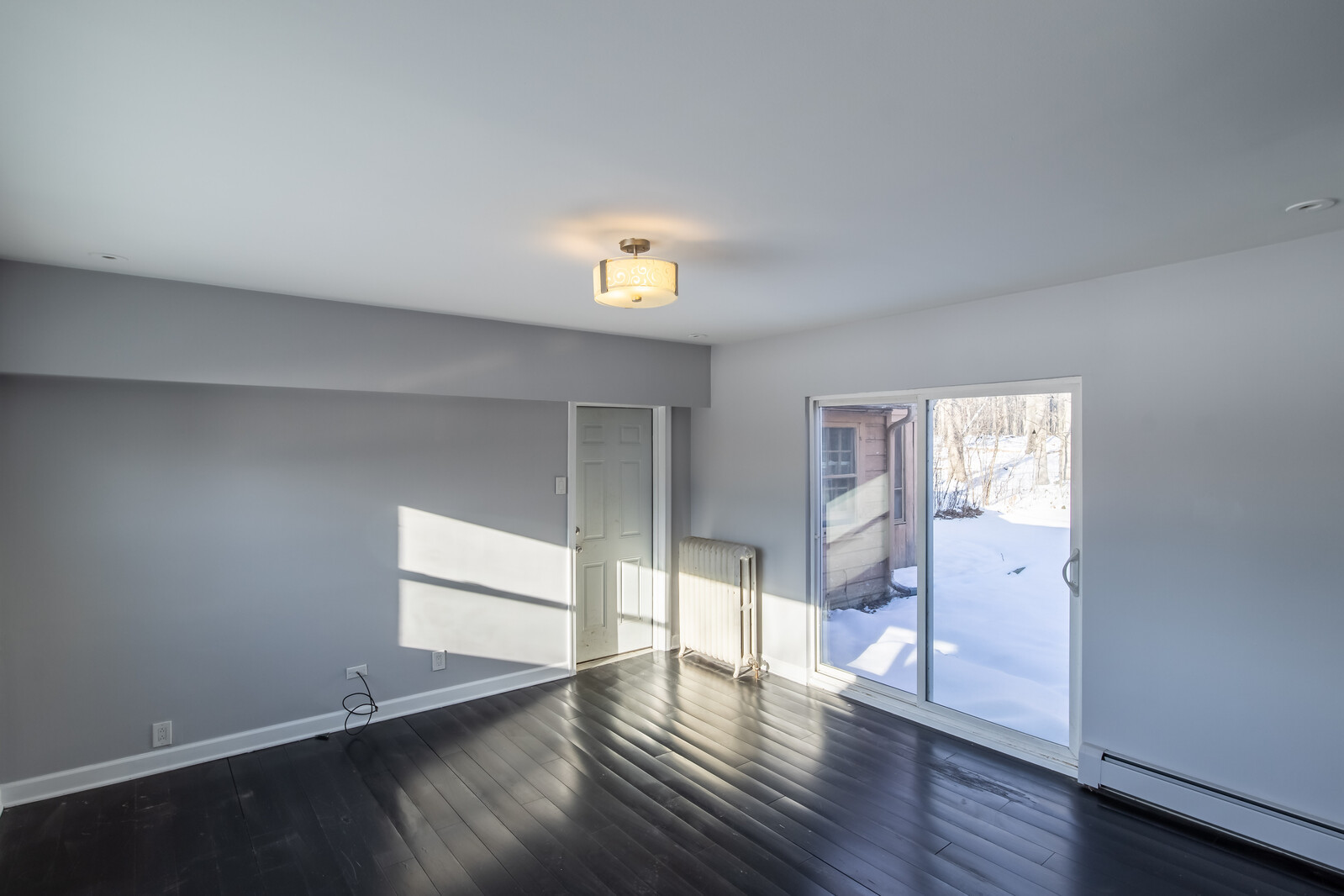 2950 Riverwoods Road Riverwoods, IL 60015 - Photo 12 of 25 an empty room with wooden floor and windows