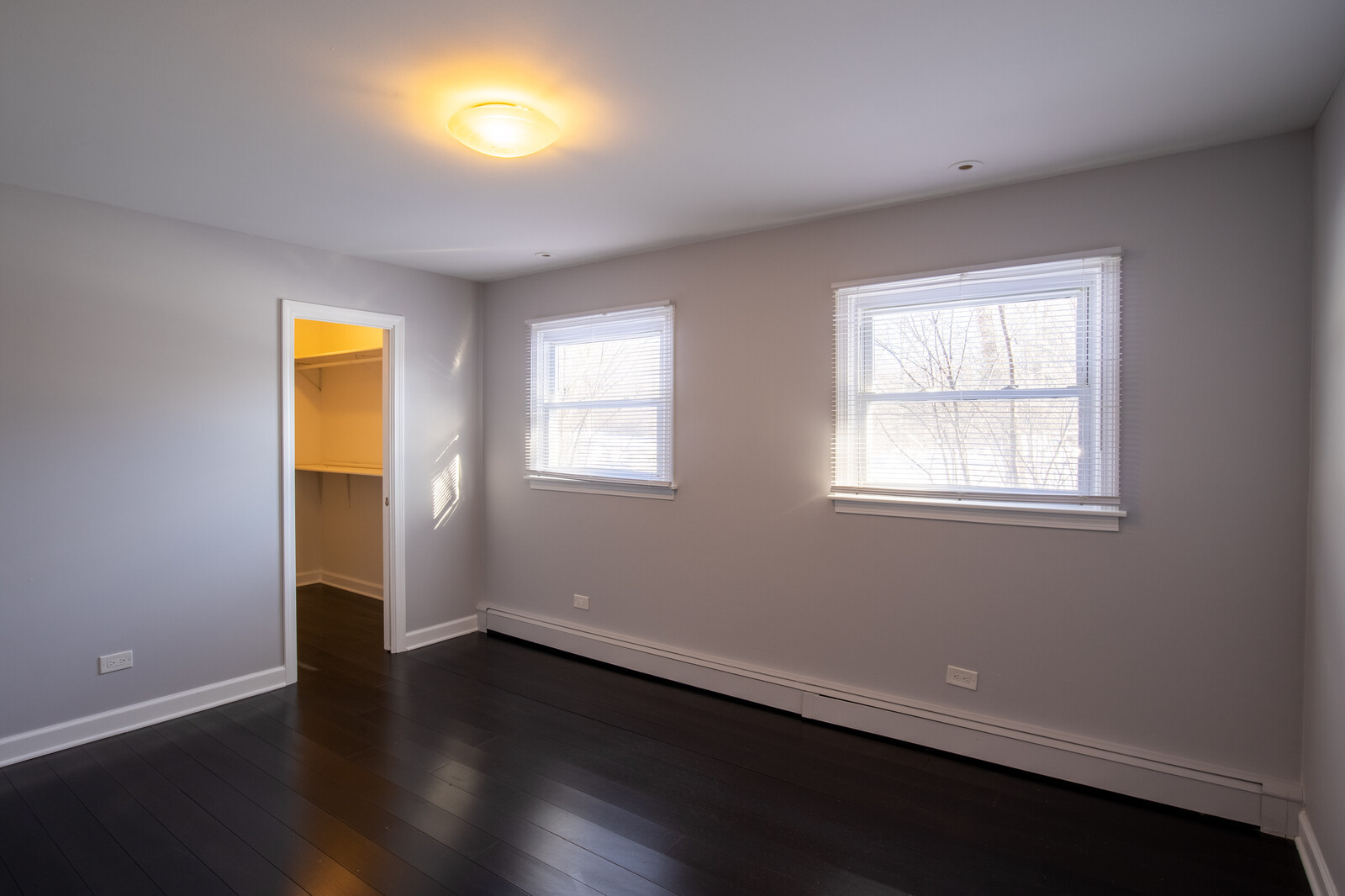 2950 Riverwoods Road Riverwoods, IL 60015 - Photo 22 of 25 a view of room with window and wooden floor