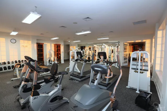 a view of a balcony with chairs