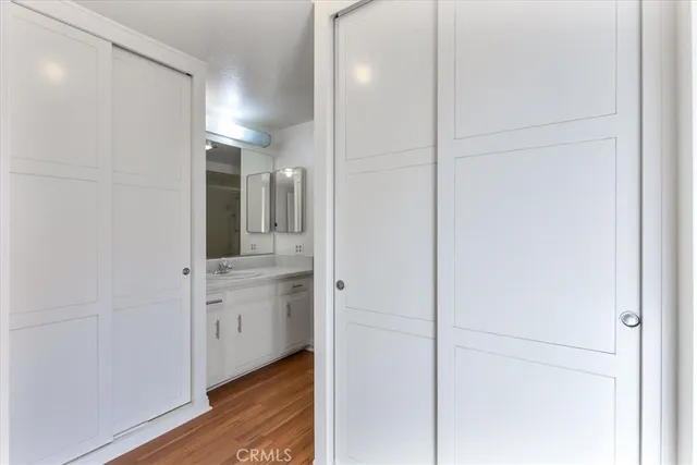 a bathroom with a shower and a sink
