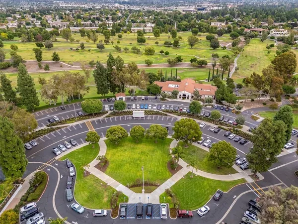 an aerial view of residential house with outdoor space and swimming pool
