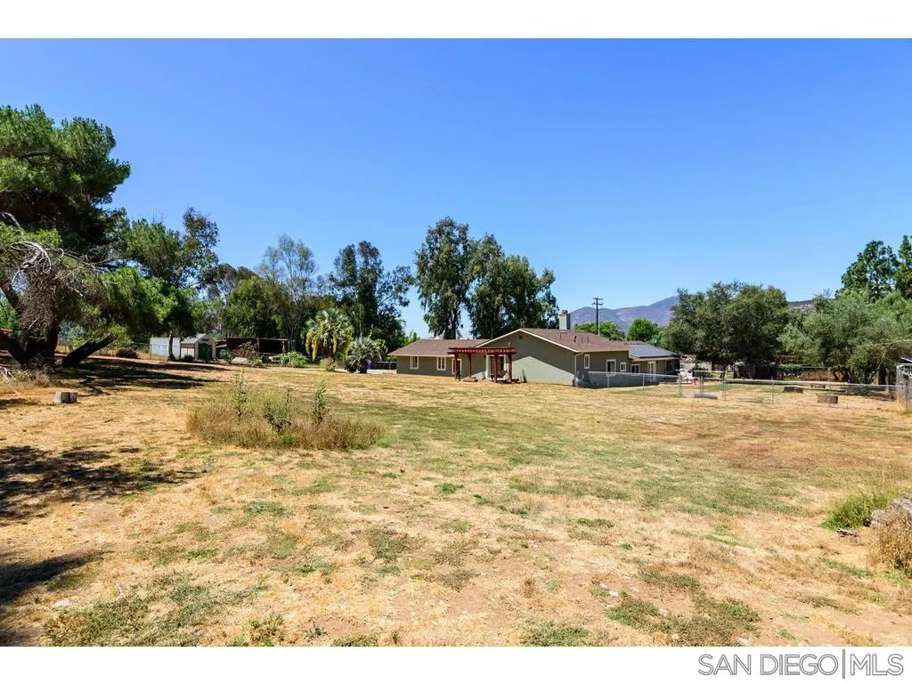 13852 Proctor Valley Road Jamul, CA 91935 - Photo 6 of 25 a view of swimming pool and mountain
