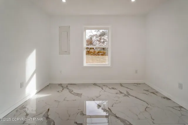 an empty room with windows