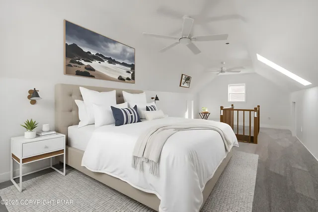 a bedroom with bed and wooden floor