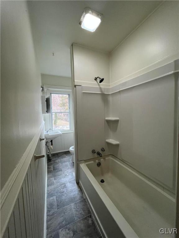 144 Jamestown Street Lehighton, PA 18235 - Photo 12 of 14 a bathroom with a tub a toilet and a sink
