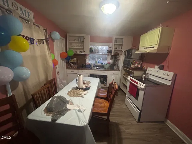 a room with furniture and a lamp