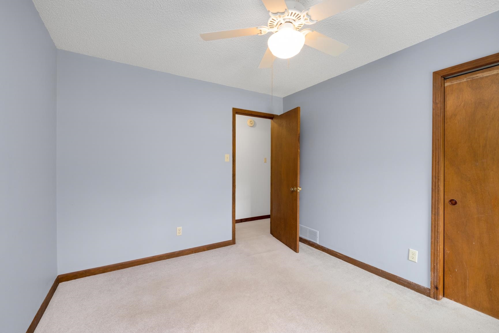 8292 Rankin Branch Road Millington, TN 38053 - Photo 19 of 33 a view of an empty room with a chandelier fan