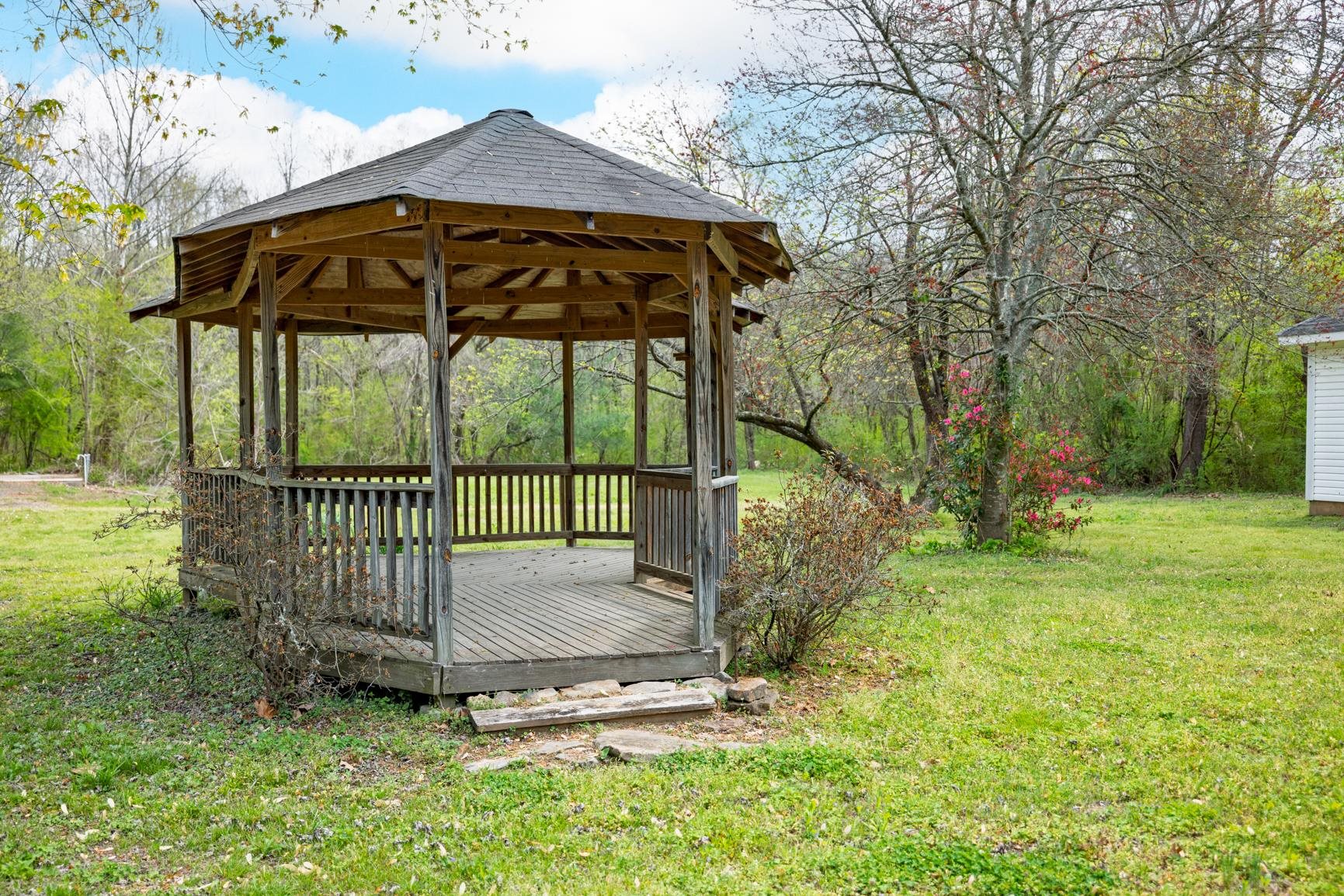 8292 Rankin Branch Road Millington, TN 38053 - Photo 26 of 33 a view of a backyard with a garden