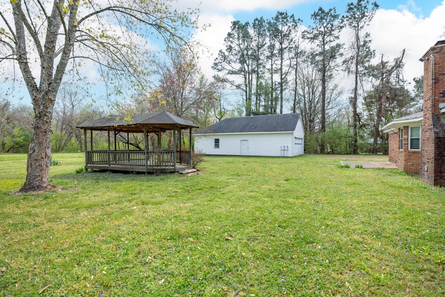 8292 Rankin Branch Road Millington, TN 38053 - Photo 27 of 33 a view of a house with a yard