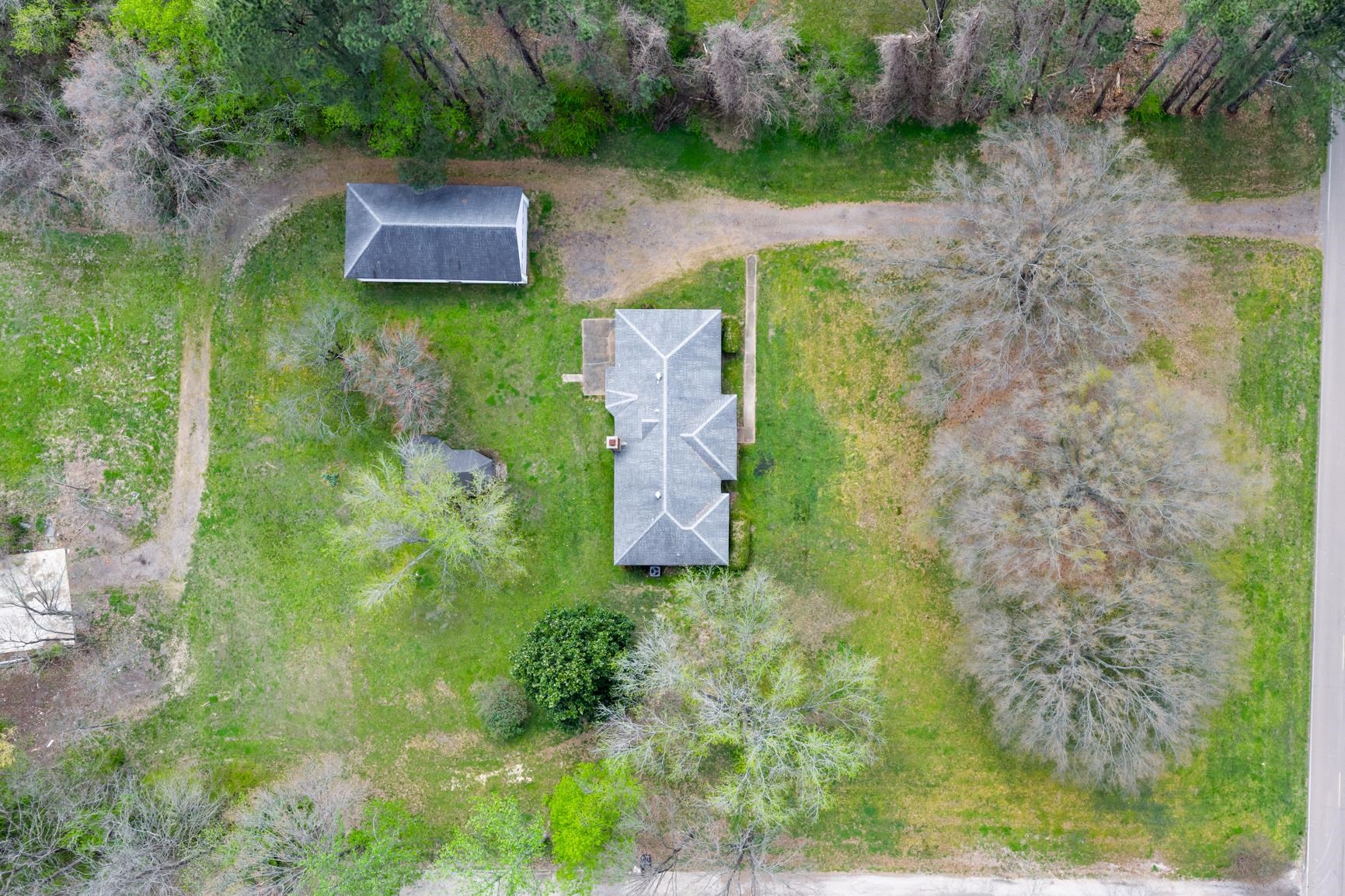8292 Rankin Branch Road Millington, TN 38053 - Photo 33 of 33 an aerial view of residential house with outdoor space