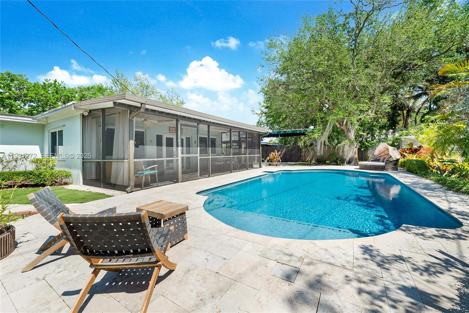 8535 Southwest 97th Road Miami, FL 33173 - Photo 20 of 28 a view of a swimming pool with a patio